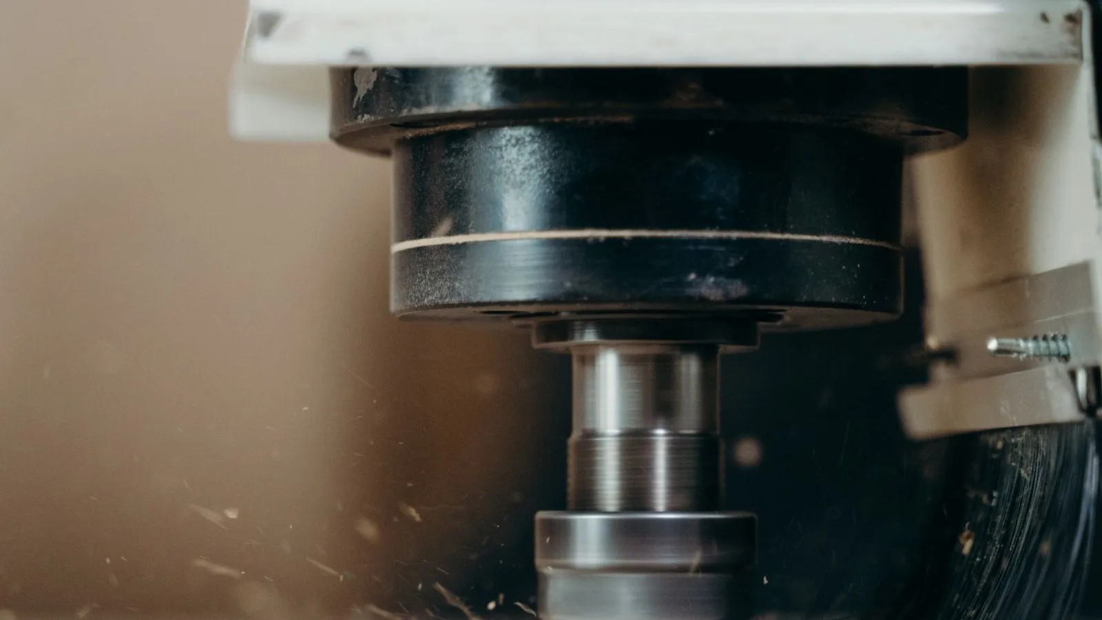 A CNC machine cutting a part in the workshop of an industrial company