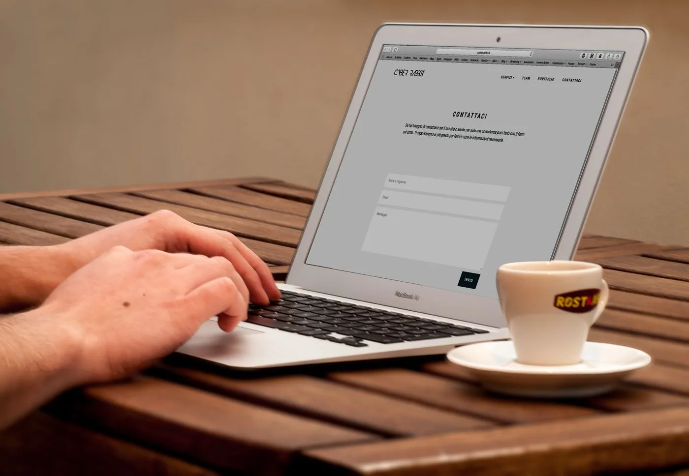 A laptop screen showing web content organised into sections and questions, the structure AI models read well