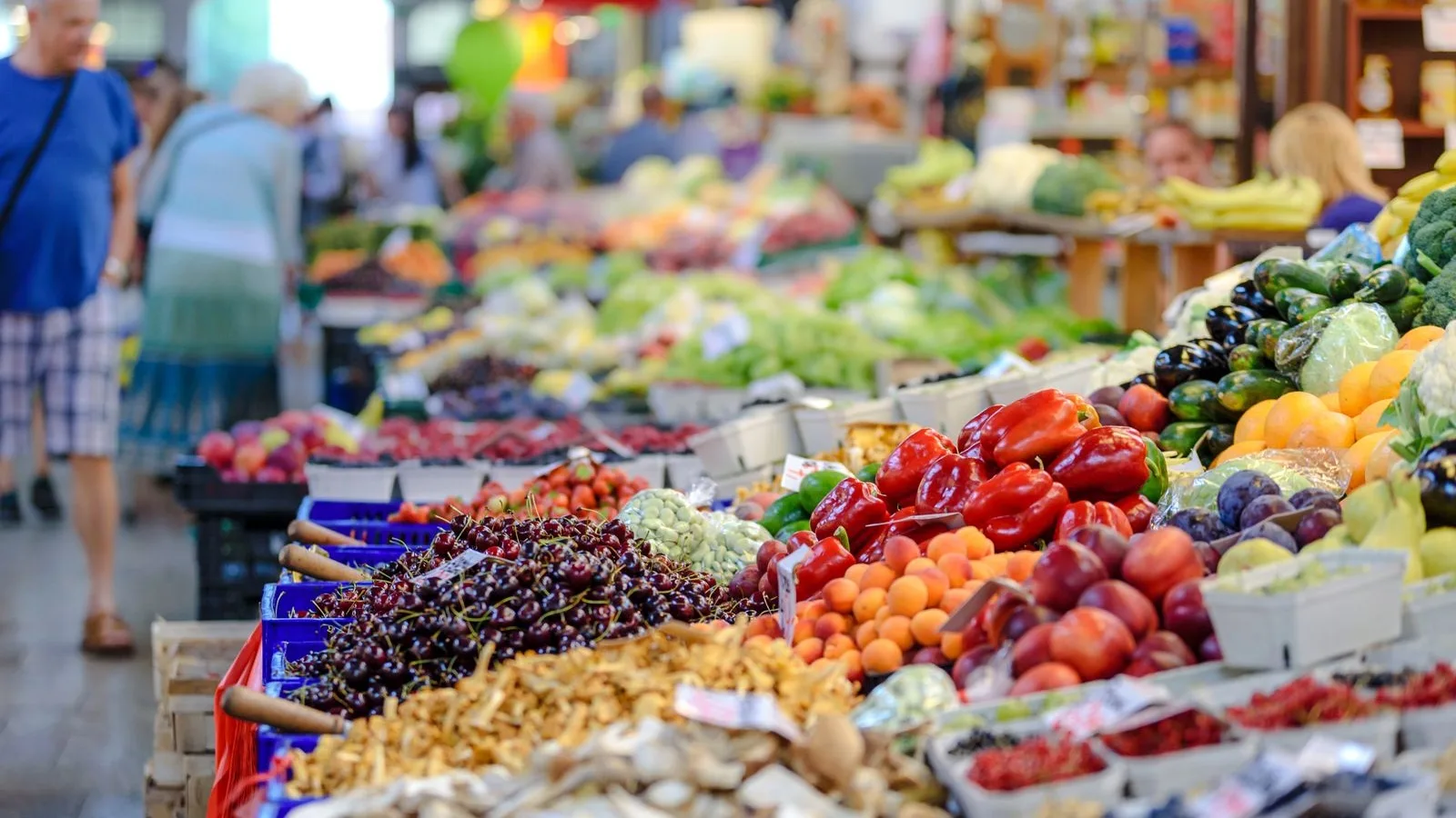 A neighbourhood market stall with fruit and vegetables on display