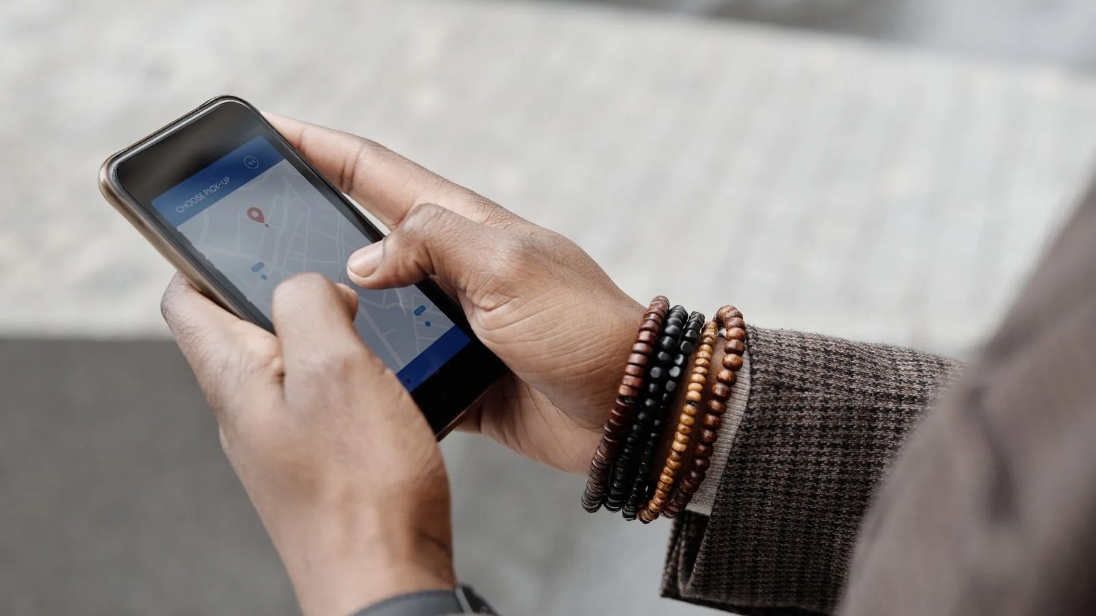 Someone looking for a nearby business on a phone map, where the call gets decided