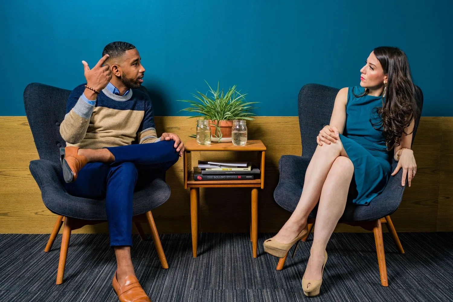 Two people talking while one explains the usual thing; a good FAQ page answers it for you